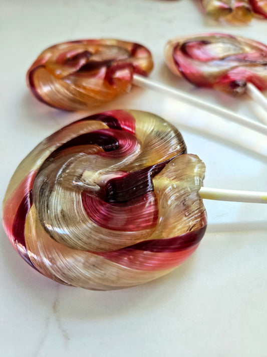 giant swirl watermelon lollipop translucent see red purple