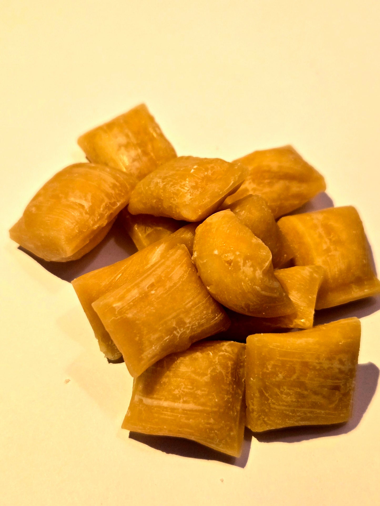Group of handmade golden maple syrup pillow candies